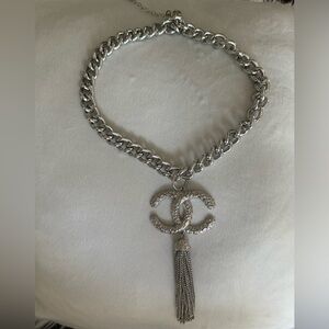 Link chain with channel charm & tassel.Costume Jewelry at its finest.never worn